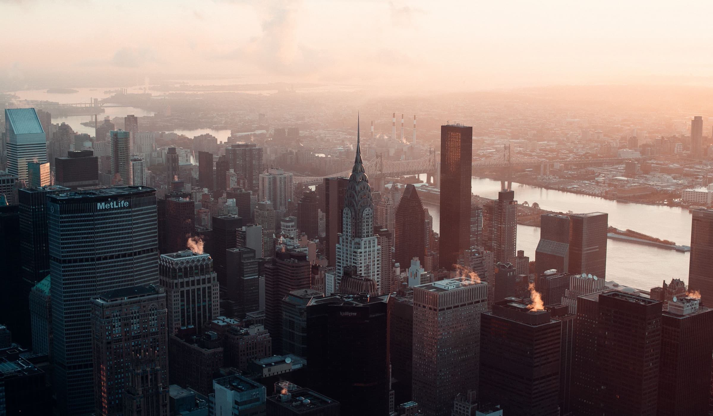 A city skyline at dawn